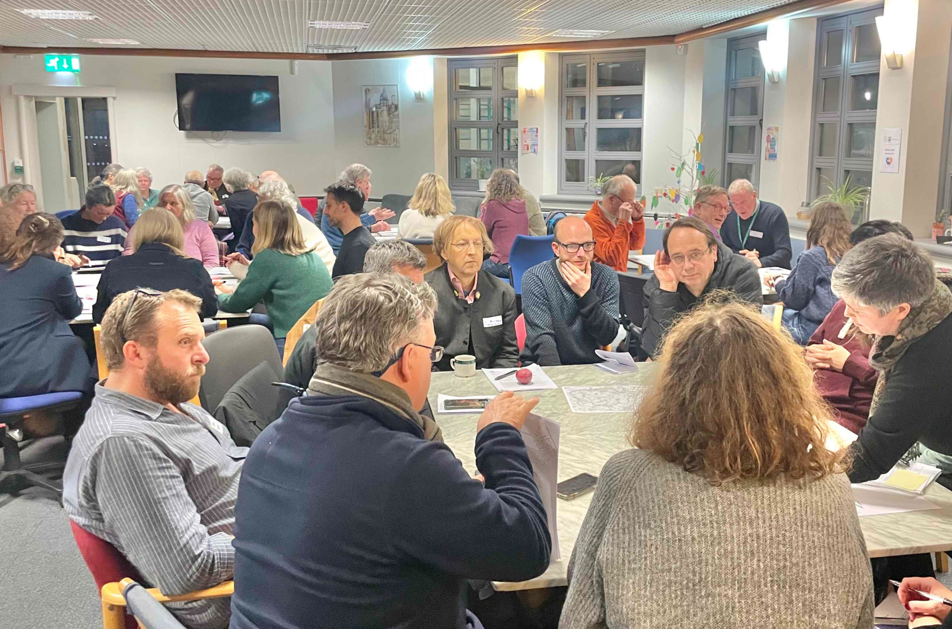 Break out session at a planning table at a community energy workshop.